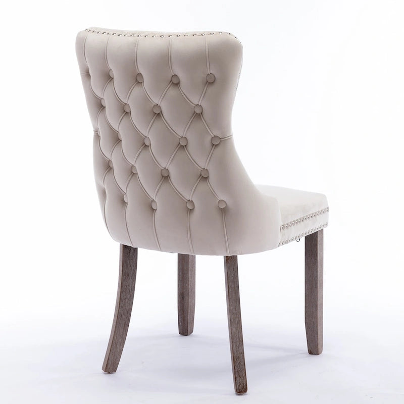 Chaise de salle à manger à oreilles en velours avec clous décoratifs et surpiqûres en losange bleues