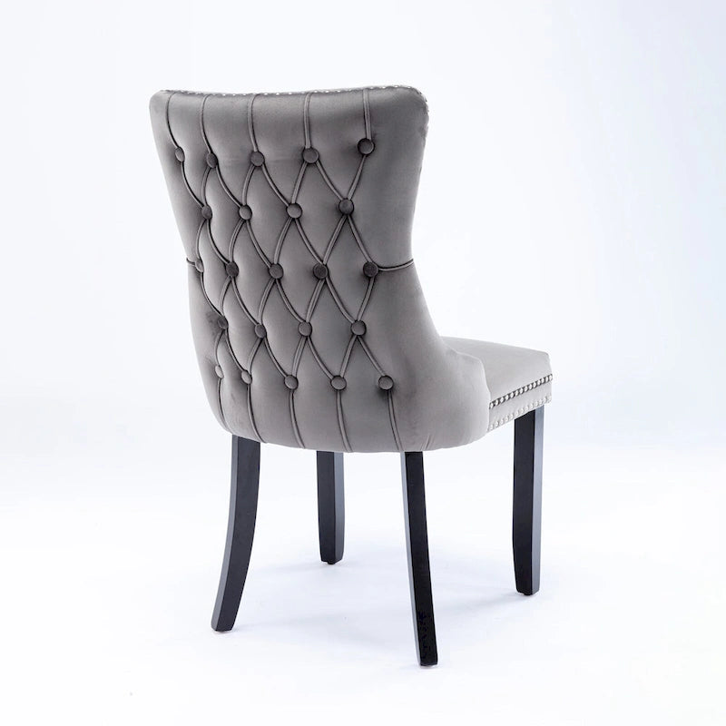 Chaise de salle à manger à oreilles en velours avec clous décoratifs et surpiqûres en losange bleues