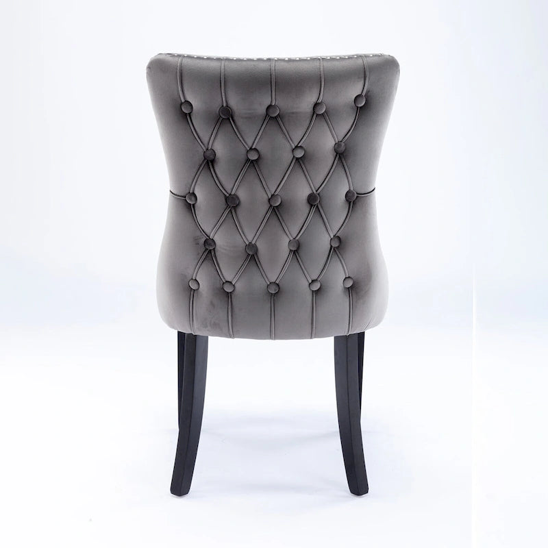 Chaise de salle à manger à oreilles en velours avec clous décoratifs et surpiqûres en losange bleues