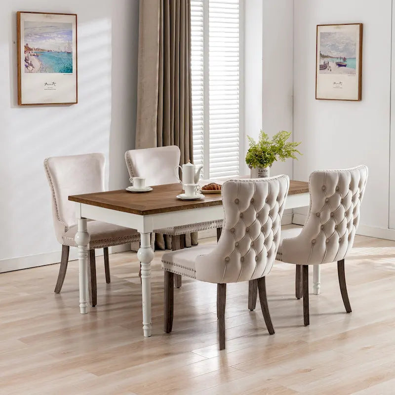 Chaise de salle à manger à oreilles en velours avec clous décoratifs et surpiqûres en losange bleues