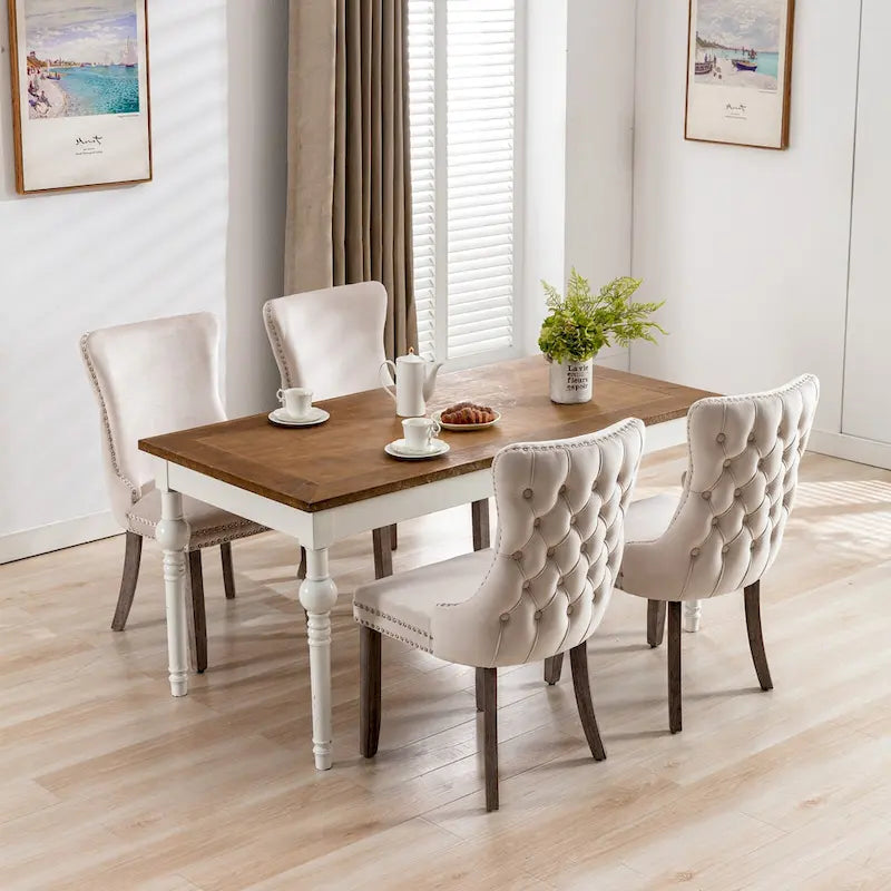 Chaise de salle à manger à oreilles en velours avec clous décoratifs et surpiqûres en losange bleues