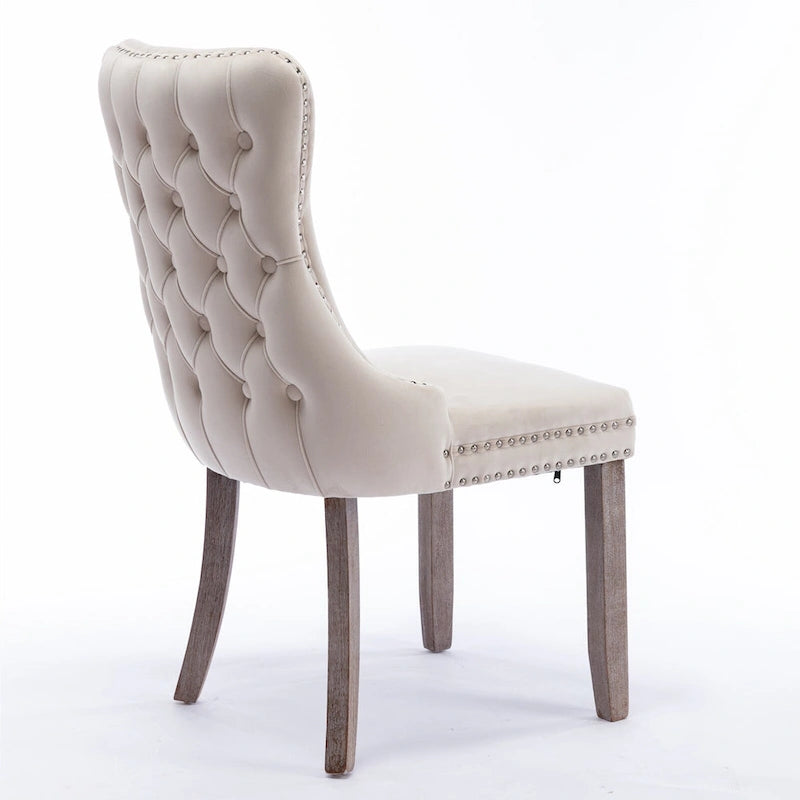 Chaise de salle à manger à oreilles en velours avec clous décoratifs et surpiqûres en losange bleues