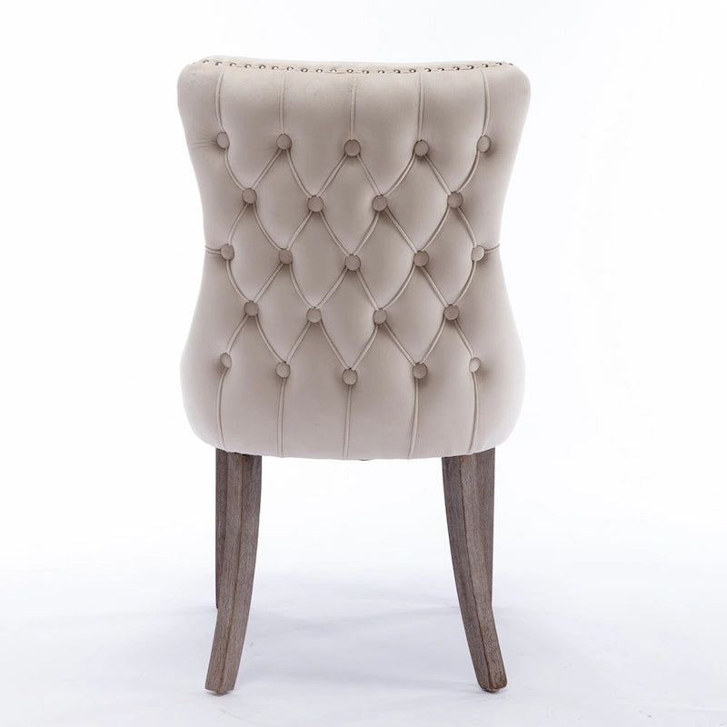 Chaise de salle à manger à oreilles en velours avec clous décoratifs et surpiqûres en losange bleues
