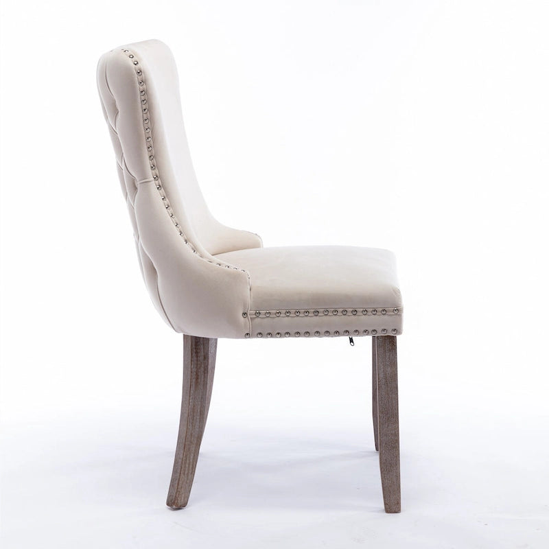 Chaise de salle à manger à oreilles en velours avec clous décoratifs et surpiqûres en losange bleues