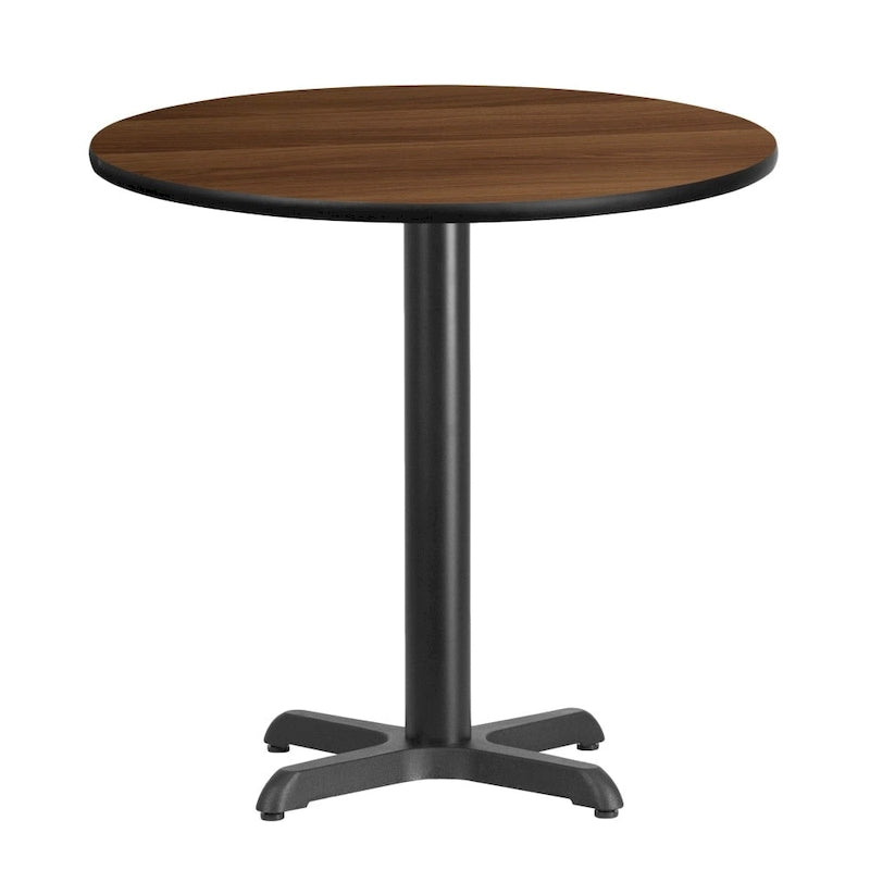 Table de salle à manger ronde en stratifié avec piétement en croix en fonte naturelle