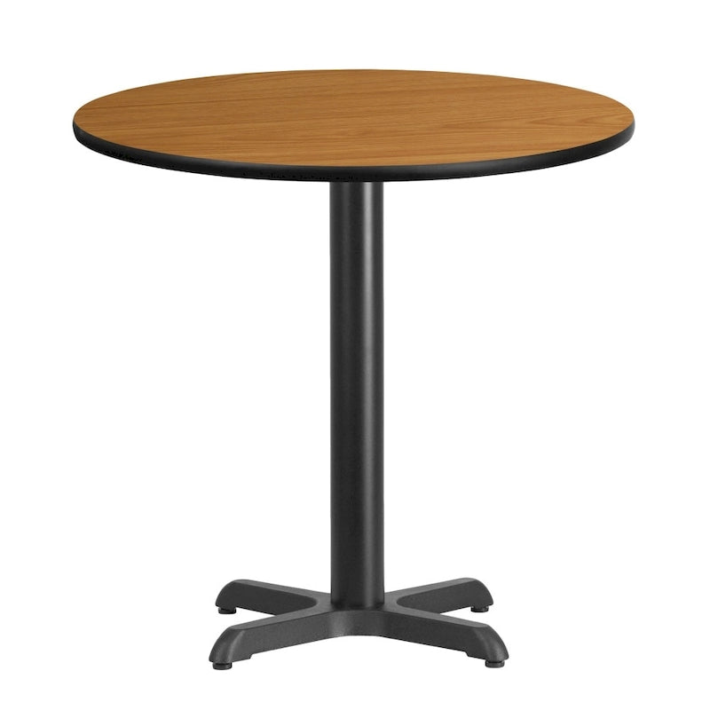 Table de salle à manger ronde en stratifié avec piétement en croix en fonte naturelle
