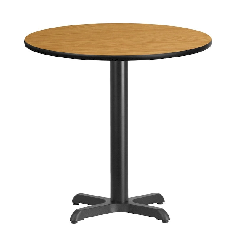 Table de salle à manger ronde en stratifié avec piétement en croix en fonte naturelle