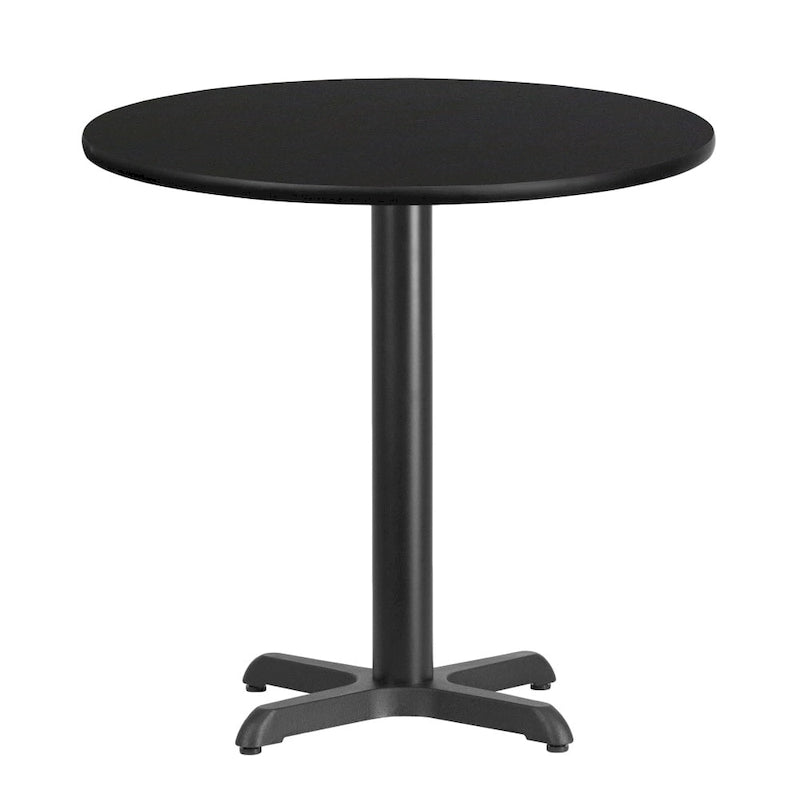 Table de salle à manger ronde en stratifié avec piétement en croix en fonte naturelle