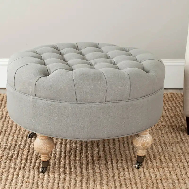 Pouf rond en lin capitonné avec pieds en bois tournés et roulettes, coloris champignon