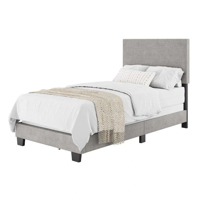 Lit plateforme capitonné jumeau avec tête de lit en tissu rembourré, pied de lit bas et pieds en bois coniques bleus
