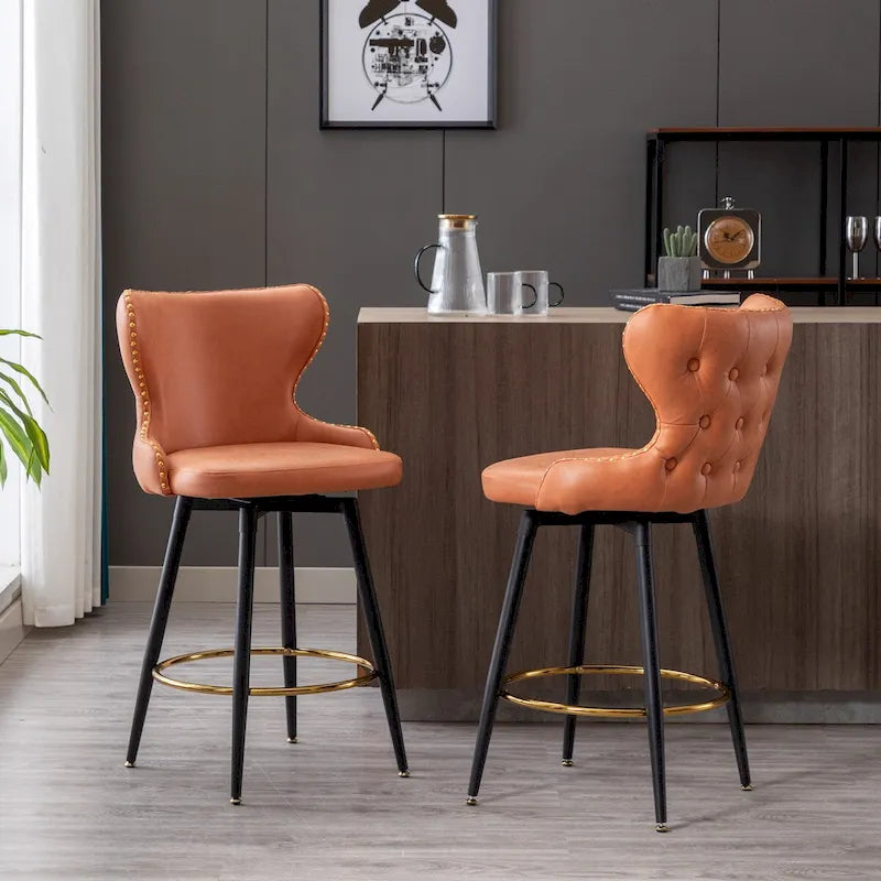 Tabouret de bar pivotant à hauteur de comptoir avec siège en similicuir à dossier capitonné et garniture de clous dorés Orange